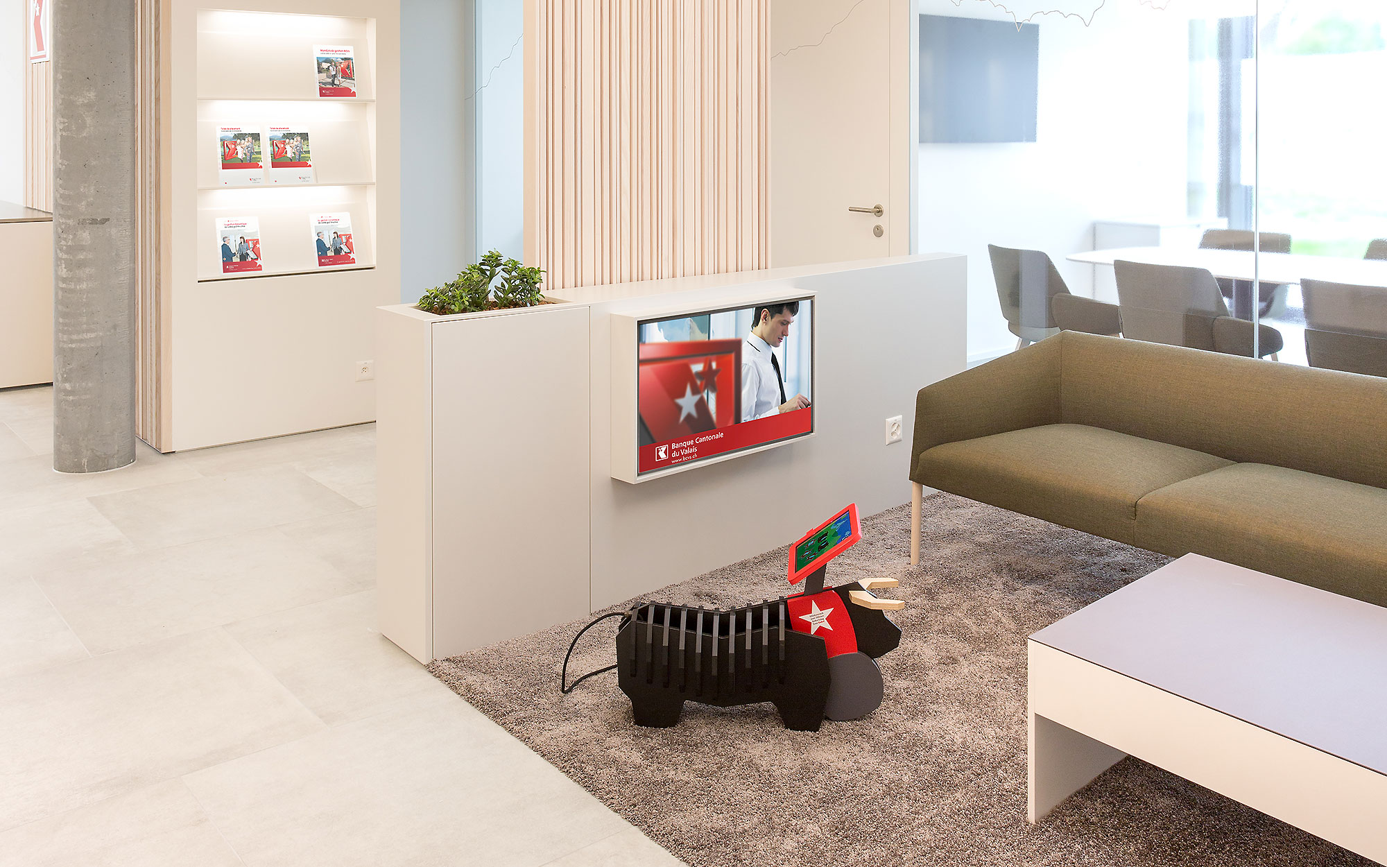 Kundenlounge mit integrierter Kinderspielecke